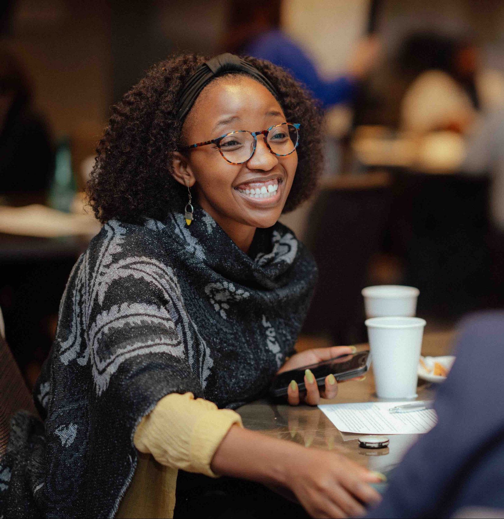 A close-up of Democracy Fund's Nora Hakizimana smiling